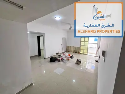 Al-Rawdah 1, near Kanz Mall: A spacious, fully bright apartment featuring a balcony, central air conditioning, and a reasonable price.