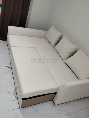 Beige L-shaped Sofa Bed with Storage, Good Condition