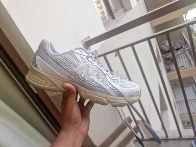 White New Balance running shoes - size available more details
