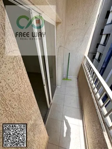 Unfurnished one-bedroom apartment (bedroom and living room) for monthly rent in Ajman; no cheques or attestations required.