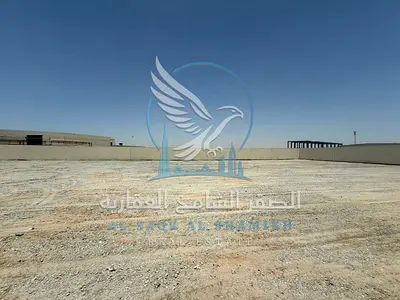 حوطة 20000 قدم بالصناعية 18 أرضية أسفلت مساحة واسعة وموقع مميز مناسب للتخزين الخارجي والمعدات والسيارات