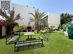 Luxury villa for rent in Al Zorah, Ajman, spanning 10,000 sq. ft. and featuring a private pool for a