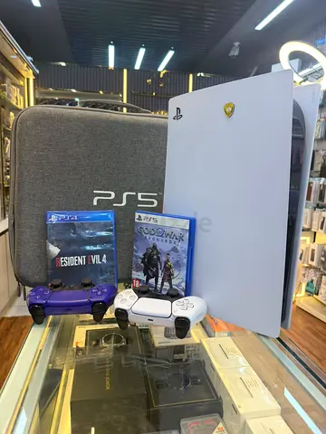 PlayStation 5 and 2 controllers 2 gaming cd