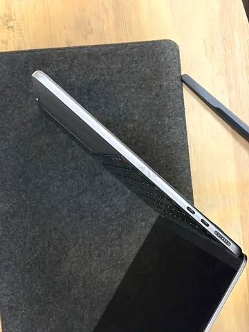 Slim silver laptop in good condition - light use