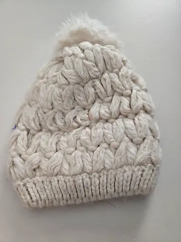 Cream knitted winter beanie with pom pom