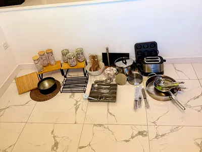 Kitchen items (pots, glass jars, book stand and more)