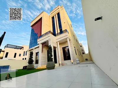 Large villa for sale in Al-Aliya, featuring luxury finishes and a swimming pool.