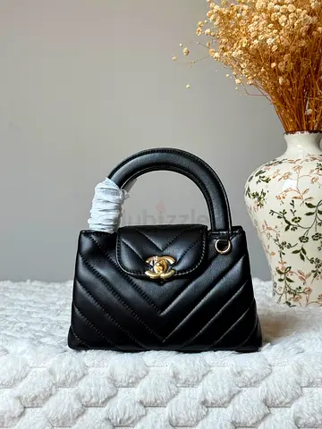 Black Quilted Top Handle Bag with Gold CC Twist Lock