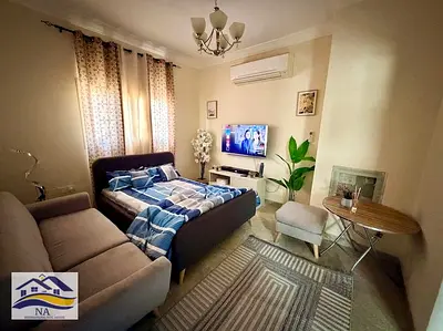 FURNISHED ROOM 1850/- IN MAJAZ 1 NEAR LULU HYPERMARKET & BUS STOP