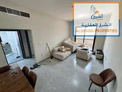 Luxury apartment in Al Yasmeen—second occupancy—featuring a spacious living room and bedroom, a
