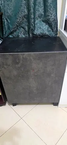 Small grey bedside cabinet / storage cupboard — good condition