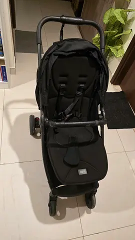 Lightweight black single stroller in good used condition