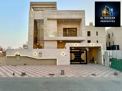 For sale in the Al-Amra area, Ajman: A property in a prime location close to all amenities, featuring a built-up area of ​​4,400 sq. ft. across two fl