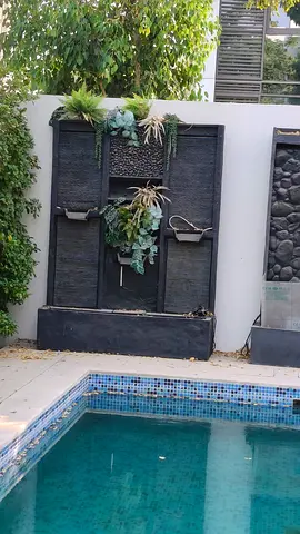 Outdoor wall fountain / vertical water feature with planters