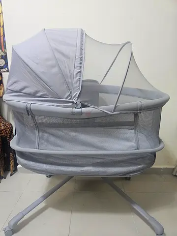 Grey Baby Bassinet with Mosquito Net and Wheels