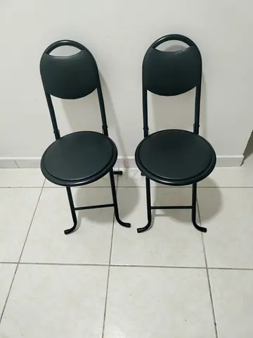 Pair of compact black metal folding table and 2 chairs  - good condition