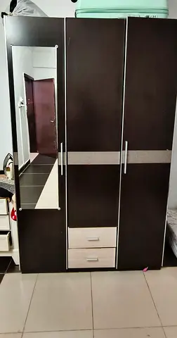 Dark wood 3-door wardrobe with mirror and drawers