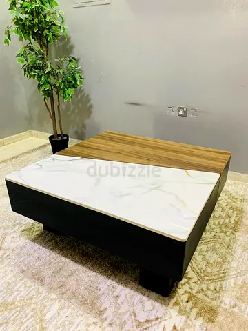 Modern two-tone coffee table with faux marble top