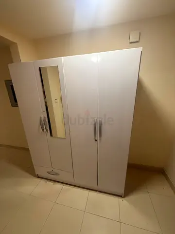 White 4-Door Wardrobe with Mirror and Bottom Drawer