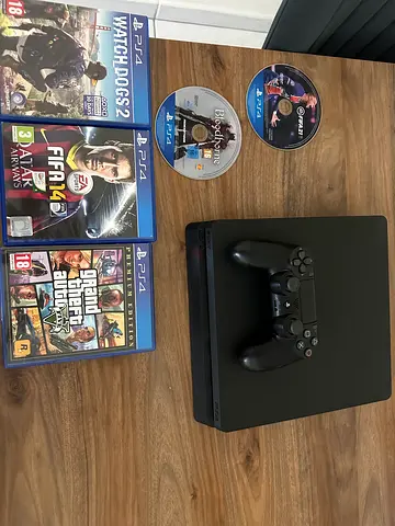 PS4 Slim with DualShock, 5Games (GTA V, FIFA 14 and 21, Watch Dogs 2, Bloodborne) - Good Condition
