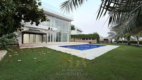 Luxury Villa for Sale in Al Zorah – Ajman | Full, Direct, Unobstructed Golf Course View | Private Pool | Private Garden | 13,500 sq. ft. Plot
