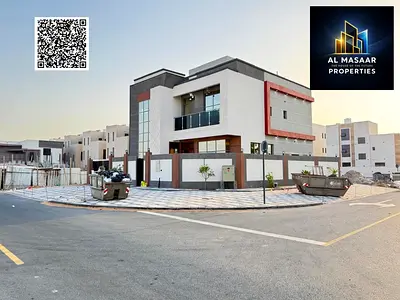 Al Yasmeen – Ajman | Modern-design corner villa | 5 master bedrooms + rooftop | Strategic location | Price includes registration fees, as well as AC,