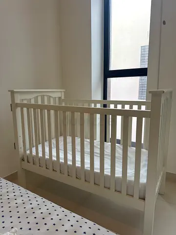 Pottery Barn White wooden baby crib / cot in good condition