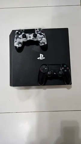 Sony PlayStation 4 Slim with  2 Controllers (1 DualShock + 1 Camo)