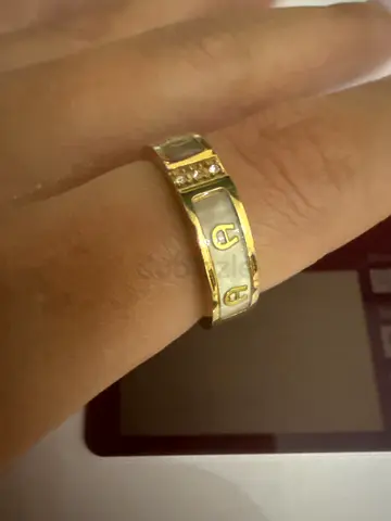 Gold-tone Aigner signet ring — size approx unknown, gently used