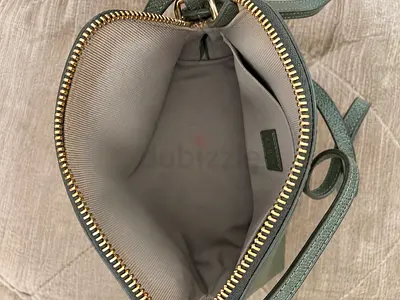 Small green leather crossbody handbag - good condition