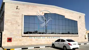 Yard with Warehouse in Al Sajaa | Prime Location | Directly on the Main Road | Modern Design | Spaci