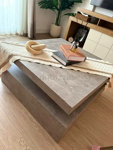 Modern two-tier coffee table in grey stone finish