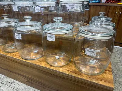 Urgent Sale ! Set of clear glass storage jars with lids - 90 Nos AED 70 / piece