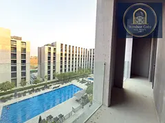 Pool View 1BHK Apartment Available in Tiraz Building