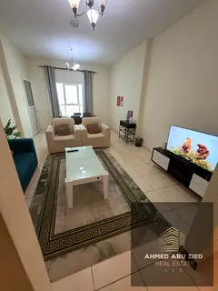 Fully Furnished 1BHK for annual rent in Orient Towers, Ajman. master bedroom, open view of the Creek