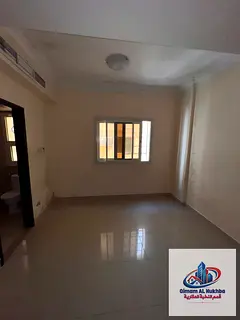Spacious studio in Abu Shagara featuring a large layout, a neat and clean kitchen, a bathroom with h