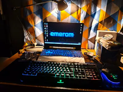Gaming laptop setup with RGB mechanical keyboard and gaming mouse