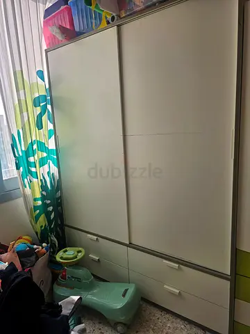 White sliding-door wardrobe with drawers - good condition