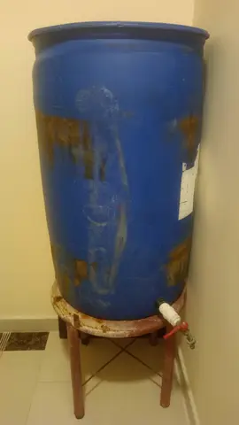 Used 200L Plastic Drum with Tap on Stand