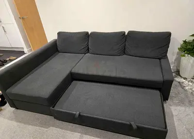 Grey L-shaped Sofa Bed with Pull-out Section