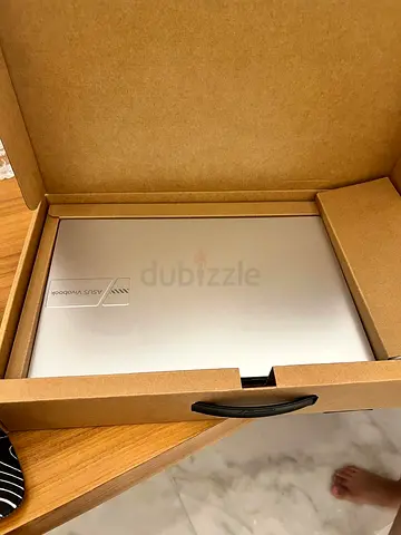 ASUS VivoBook laptop - Silver, lightly used, in original box