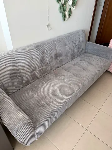 Grey three-seater corduroy fabric sofa in good condition