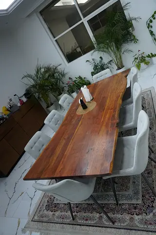 Solid live-edge wooden dining table with 8 upholstered chairs - excellent condition