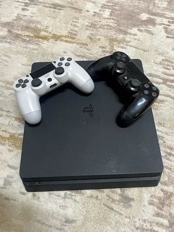 PlayStation 4 Slim 500gb with 2 DualShock Controllers (price slightly negotiable)