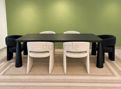 Modern black dining table with 6 upholstered chairs