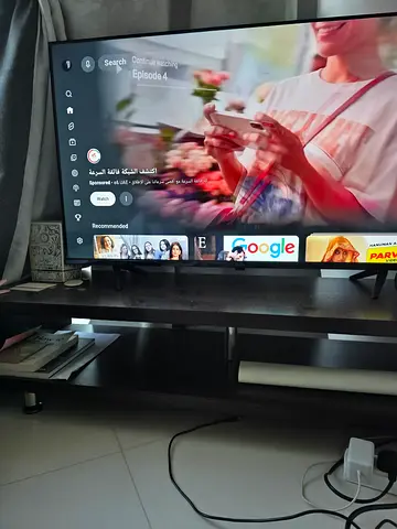 43-inch LED Smart TV in good working condition and Table