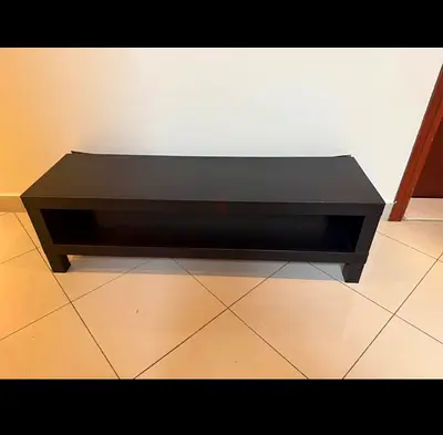Simple black TV stand / media console with shelf