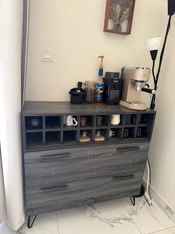 Grey wooden sideboard cabinet with wine cubby and drawers