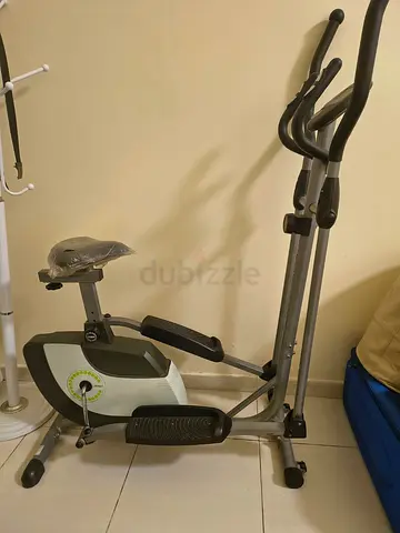 Used elliptical cross trainer with adjustable seat - good condition