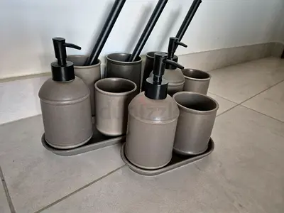 Set of soap dispensers tray cup and brush
